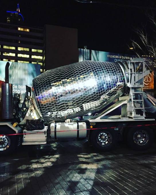 Only in Montreal! As part of @mtlenlumiere Festival en Lumière here's one of the Illuminart pieces of art! A Disco Ball Cement Mixer! @illuminartmtl it's installation in the heart of the Festival is to encourage, and I quote, "this freaky, daring diversion invites everyone to hit the improvised dance floor for a huge open air party" 