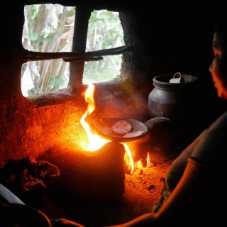 cooking pol roti