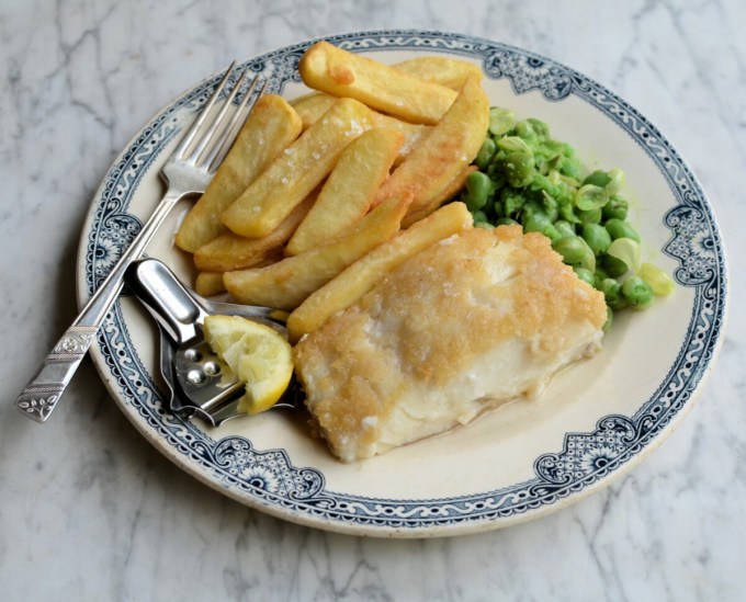 Serve the freshly fried fish with the chips