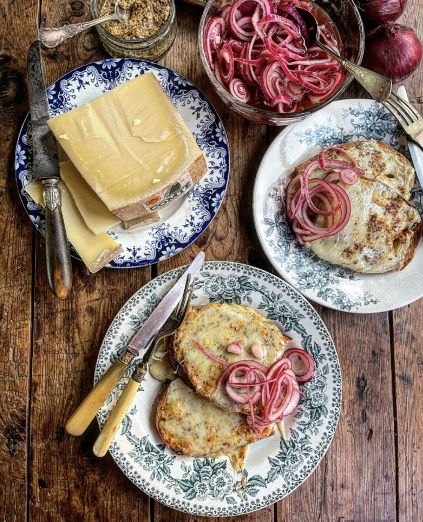 Comté Rarebit on Sourdough Toast with Quick Pickled Red Onions