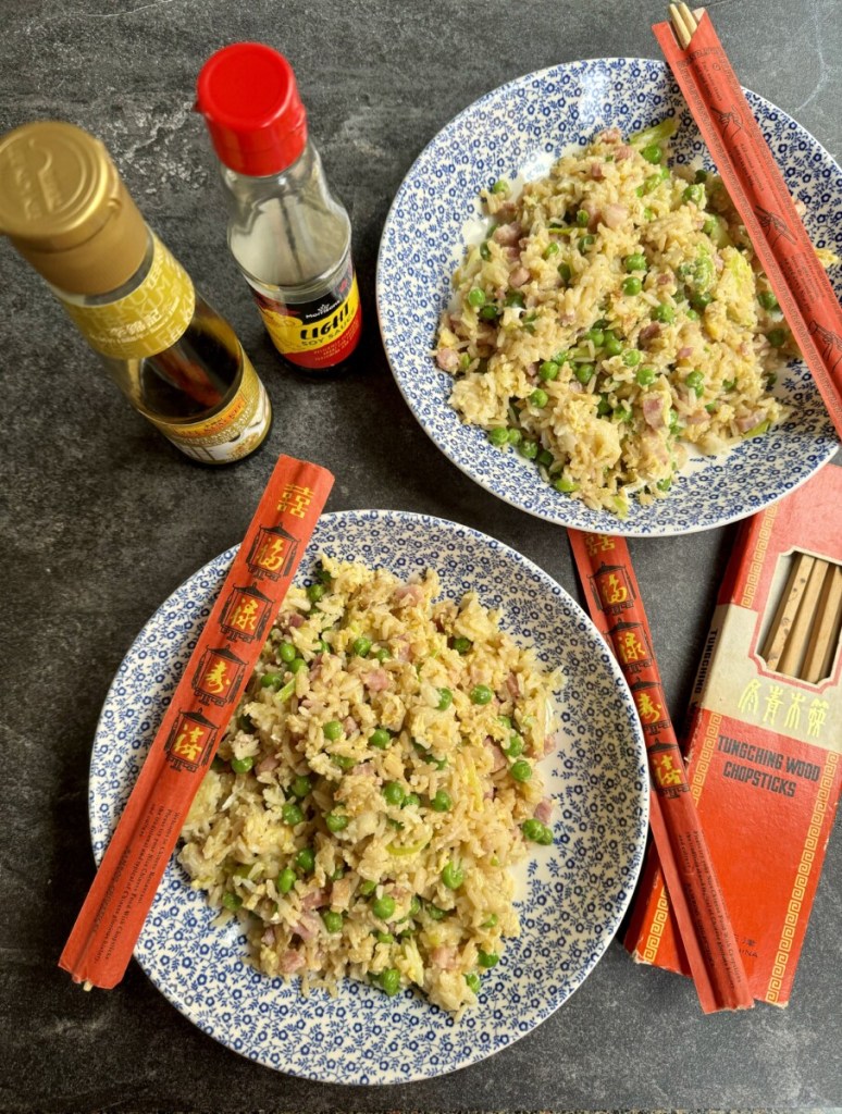 Mainly given that she had access to Western ingredients that we used to buy from the NAAFI, and that there was always leftover cooked rice.

The smell as it's cooking and the taste takes me right back to my childhood in Hong Kong, and it's such an easy dish to cook too.

It's a very versatile dish, using cold leftover rice, bacon, spring onions, frozen peas and eggs.