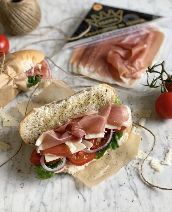 Italian Sub Sandwich with Prosciutto di Parma, Salad, and Cheese