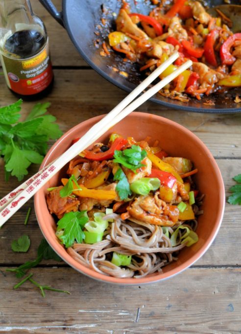 Kung Pao Stir-Fry Chicken and Noodle Bowls - Delicious bowls of noodles with spicy Kung Pao Chicken & Peppers, all made with ease using Lee Kum Kee's ready-made Kung Pao Chicken Stir-Fry sauce, and on the table in under half an hour. 